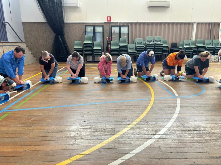 Clients practising CPR chest compressions in a group HLTAID009 training session at IRFA Sippy Downs — group discounts available, RTO 32154